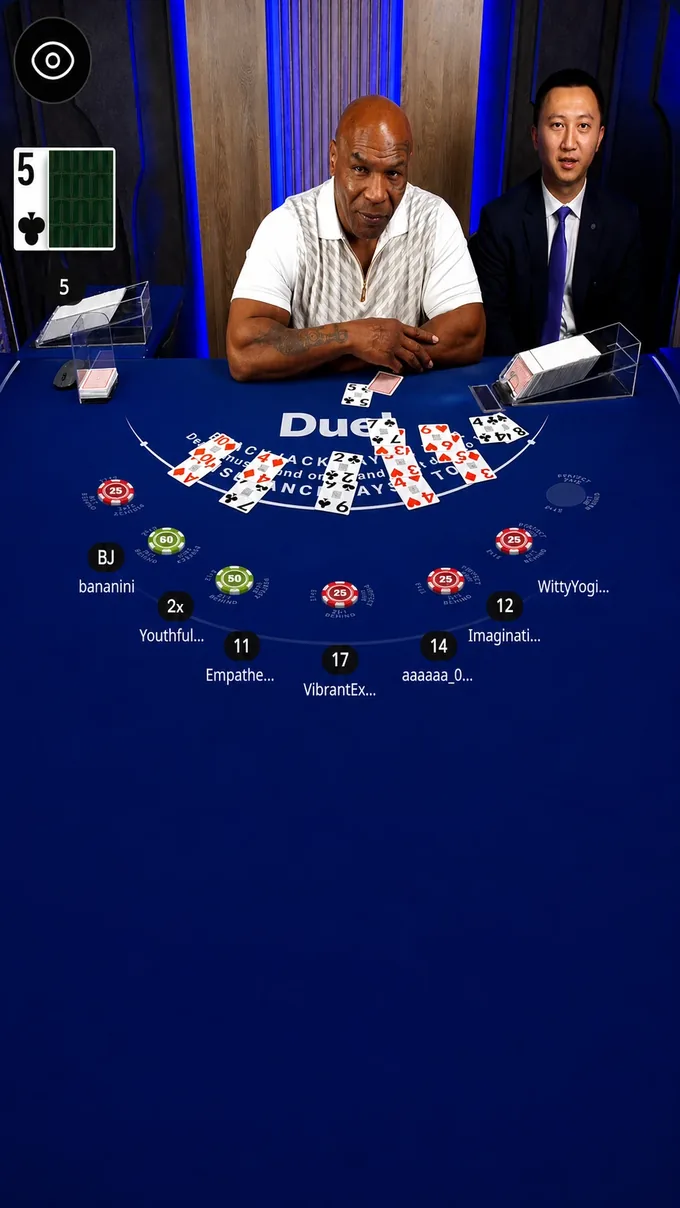 Mike Tyson dealing live blackjack at Duel Casino, with the legendary boxer as live dealer